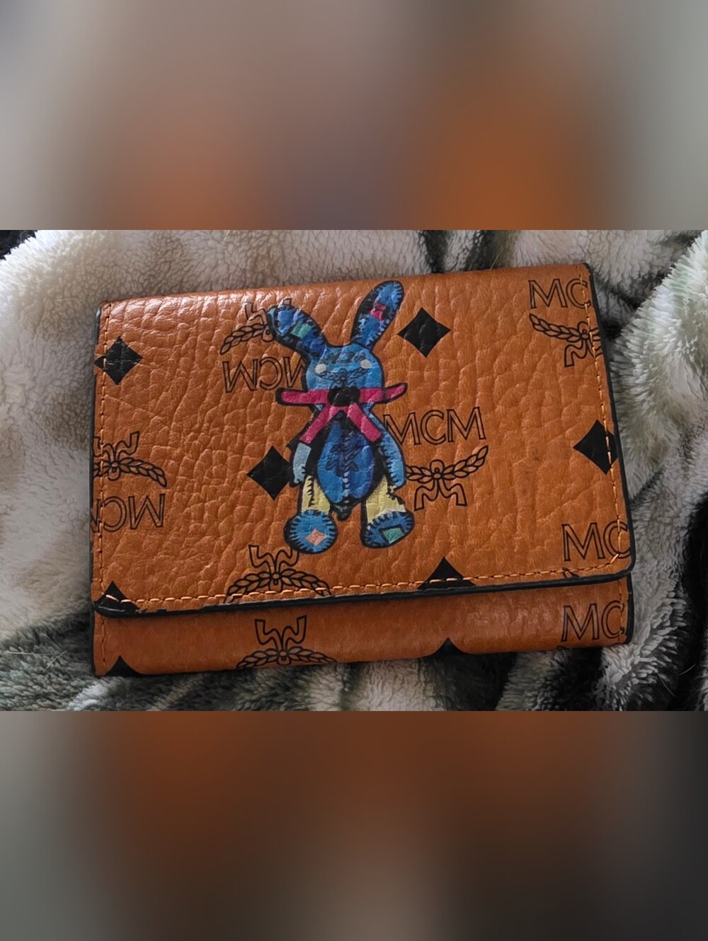MCM Orange Monogram Wallet with Blue Bunny Accent
